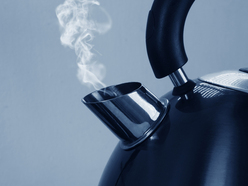 close-up of spout of boiling kettle