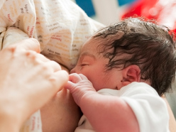 newborn baby breastfeeding 